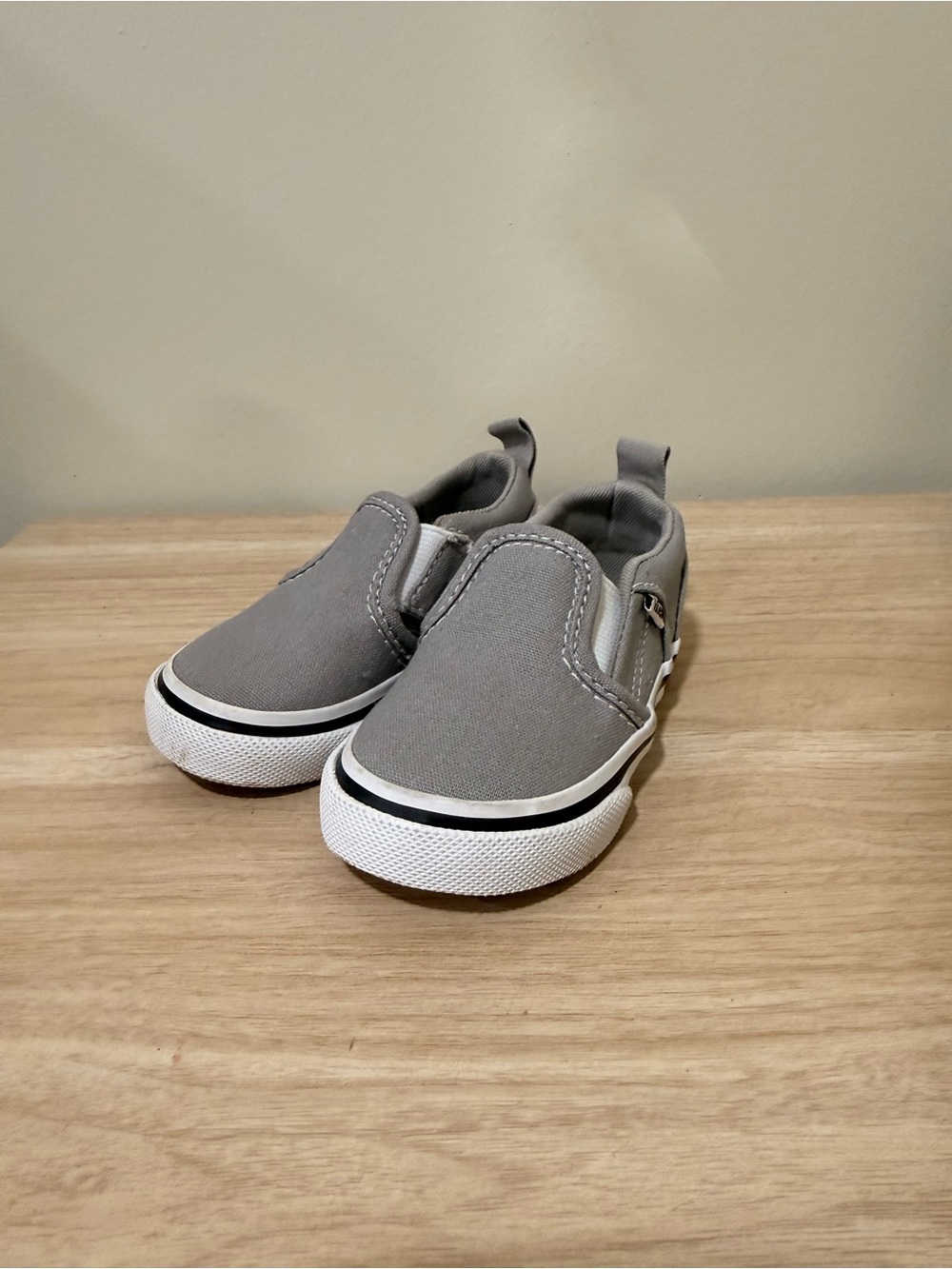 Vans Kids Slip-On Sneakers in Gray and White